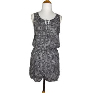 BCBGeneration Women's Sleeveless Black White Romper Size S with Pockets